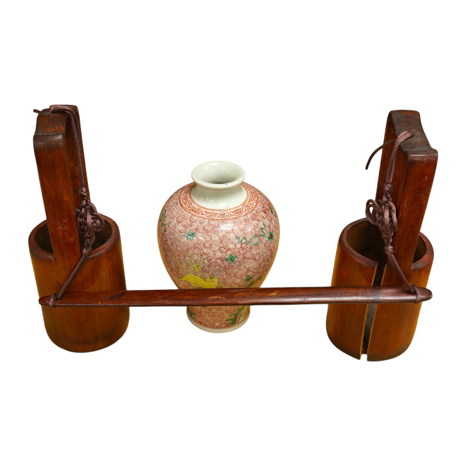 A Chinese famille rose jardiniere and bamboo oak rail, famille rose jardiniere 27cm diameter. Condition - jardiniere cracked from rim and restored, bamboo side cracked